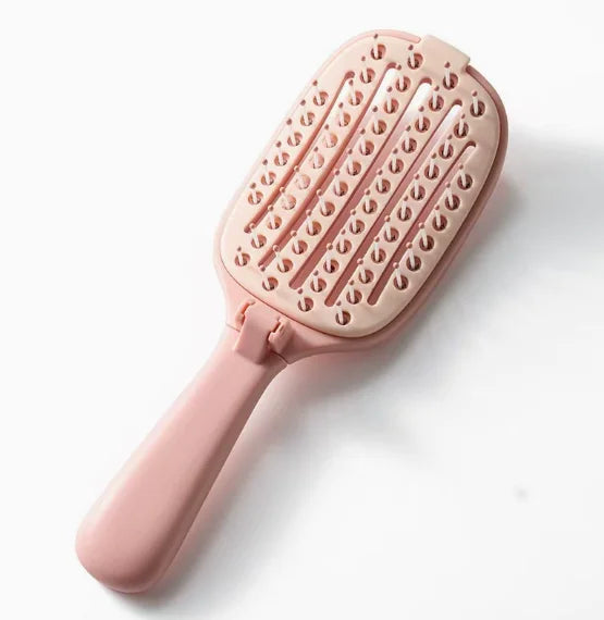 The LuxeGlide™ Self-Cleaning Brush